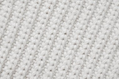 Beyaz örülmüş yün kumaş dokusu arkaplanı