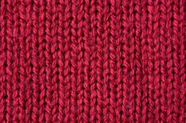 Kırmızı örülmüş yün dokusu arkaplanı