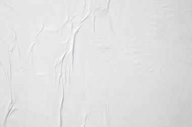 Boş beyaz buruşmuş ve buruşmuş kağıt poster dokusu arka planı