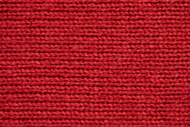 Kırmızı örülmüş yün dokusu arkaplanı