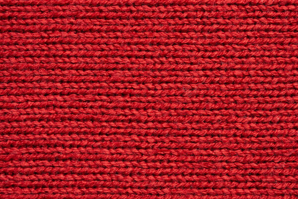 Текстура красной вязаной шерсти