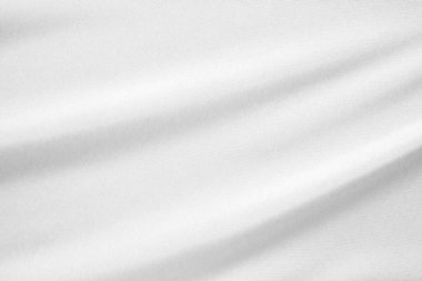 Yumuşak dalga dokusu arka planına sahip soyut beyaz kumaş