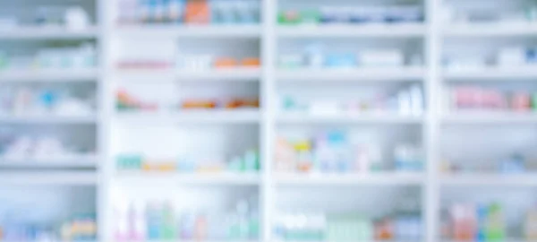 pharmacy drugstore shelves interior blurred abstract background