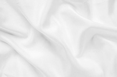 Yumuşak dalga dokusu arka planına sahip soyut beyaz kumaş