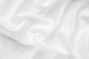 Yumuşak dalga dokusu arka planına sahip soyut beyaz kumaş