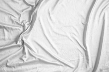 Soyut beyaz kırışık yatak örtüsü kumaş dokusu arka planı