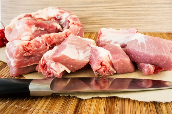 Raw pork ribs on wooden background — Stock Photo, Image