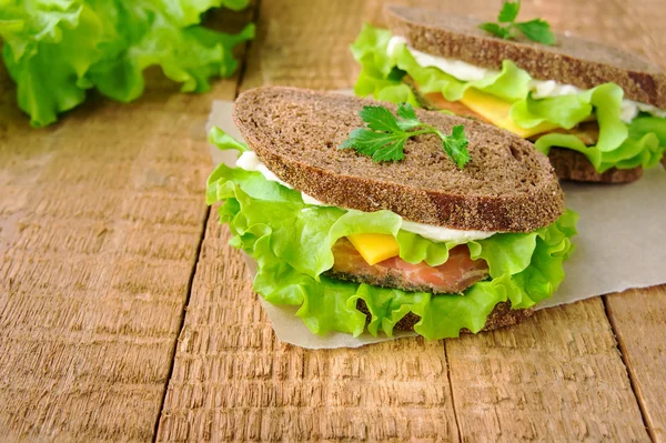Dos sándwiches con salmón ahumado —  Fotos de Stock