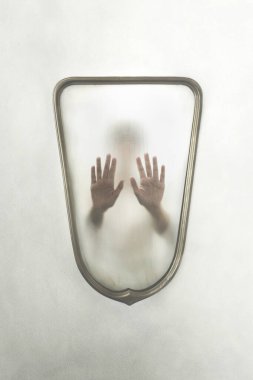person imprisoned in a mirror, concept of identity crisis clipart