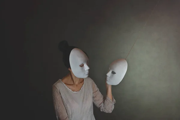 Woman Mask Chooses Another Mask Herself Concept Introspection — Stock Photo, Image