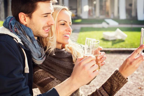 Couple in love gets a Selfie while drinking aperitif — Stock Photo, Image