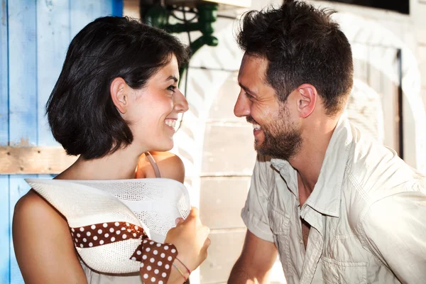 Couple in love jokes at the restaurant by the lake — Stock Photo, Image