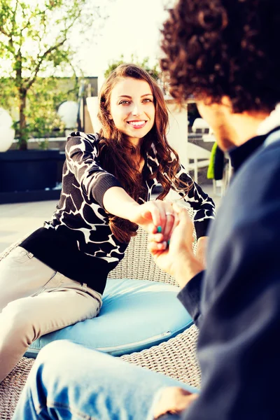 Pretty young woman flirting with her boyfriend — Stock Photo, Image