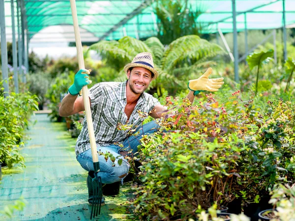 Availability farmer posing for a photo with His pitchfork — Stock Photo, Image