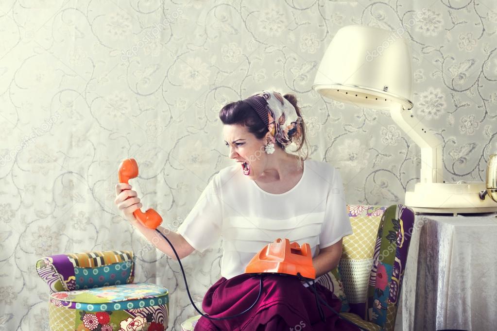 Vintage housewife shouting on the phone at Salon