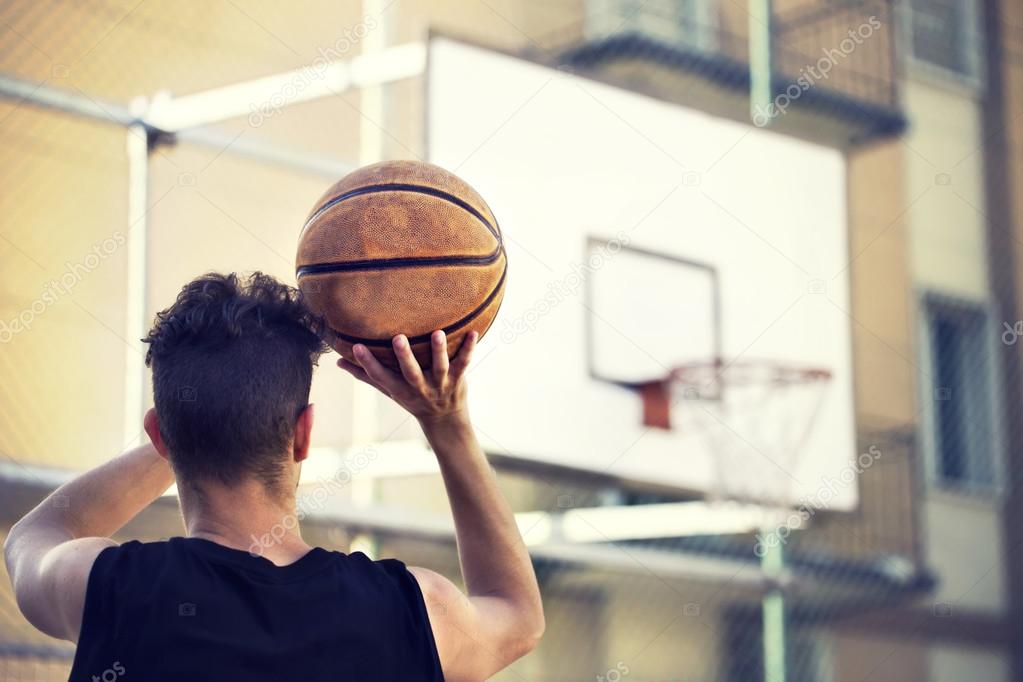 young basketball player ready to shoot