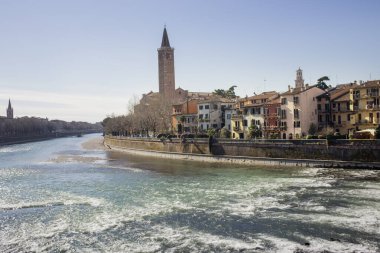 Panorama of the Adige River and the historic houses and Church of Santa Anastasia