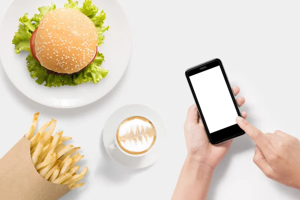 Σχεδιαστική φιλοσοφία του mockup χρησιμοποιώντας smartphone με μπιφτέκι, πατάτες τηγανιτές και σετ καφέ — Φωτογραφία Αρχείου