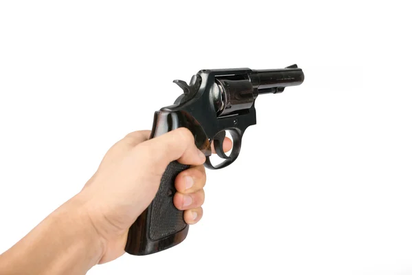 白い背景があるに分離された黒いリボルバー銃を持つ男性の手 — ストック写真