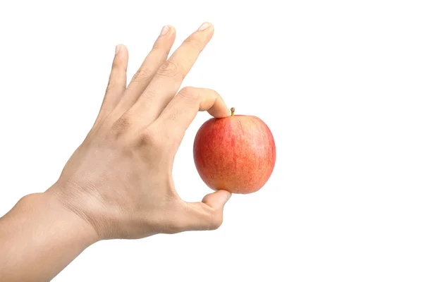 Czerwone jabłko w rękę mężczyzna na białym tle — Zdjęcie stockowe