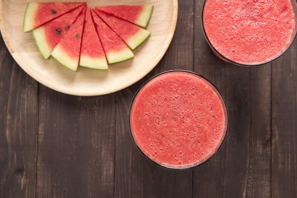 Healthy watermelon smoothie on a wood background. — Stock Photo, Image