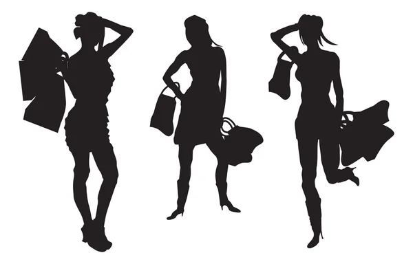 Mujeres con bolsas de compras — Vector de stock