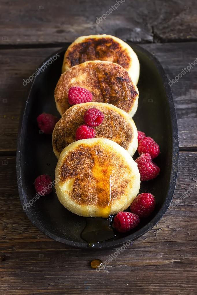 Cottage Cheese Pancakes With Raspberries On Old Iron Pan Stock