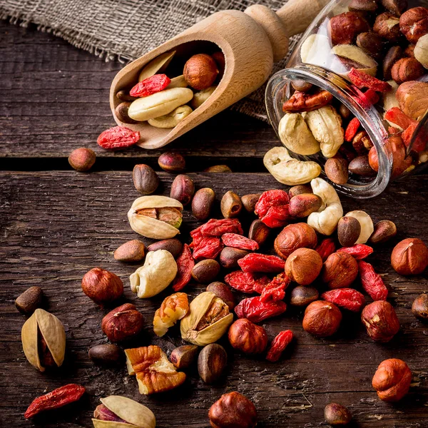 Scatterede nuts  and shovel.