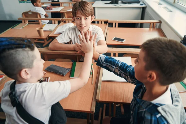 Three friends having good time at school together — Stock Photo, Image