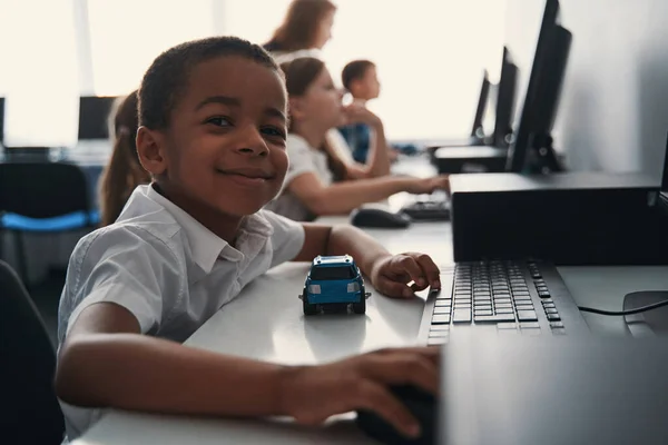 Adorable child learning how to use computer — Stock Photo, Image