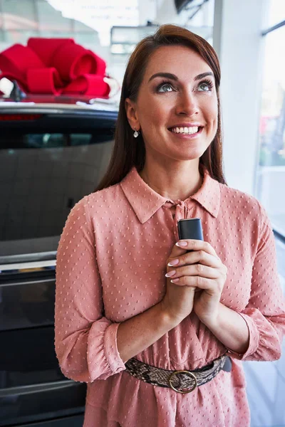 Caucasian woman feeling happy to become driver — Stock Photo, Image