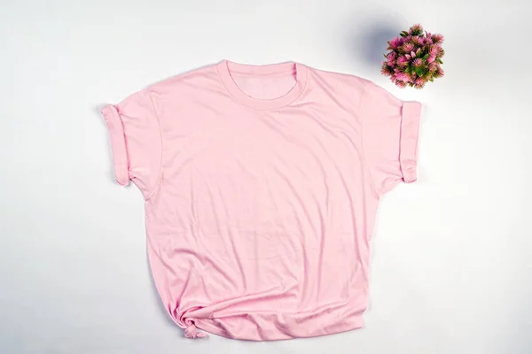 Plain t-shirts made of cotton are comfortable to use for everyday. This t-shirt goes well with black pants or any color. Plain clothes are simple but make you look cooler. T-shirt mockup.