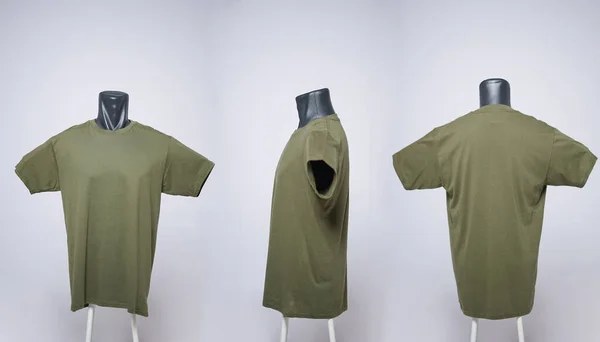 Dark green men\'s blank t-shirt template, view from three directions, natural shape on black mannequin, for your mockup design to print, isolated on white background. Free space for your ad. Focus blur.