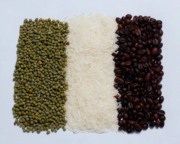 Green beans, rice and coffee beans isolated on white background. Grain mockup. Focus blur.