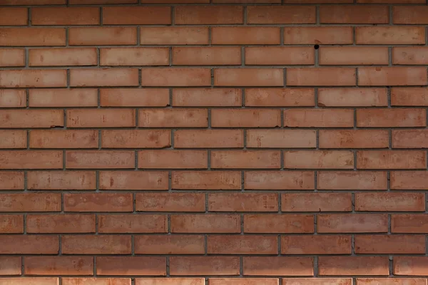 The texture of a decorative brick is brown. Close-up.Texture