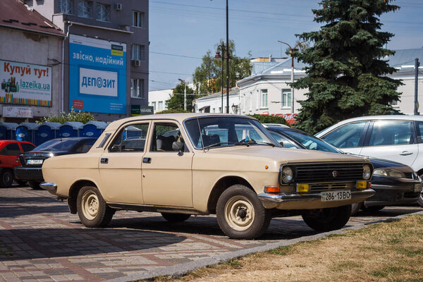 Lutsk, Ukraine - May 19th, 2020: Soviet old car Gaz-2410 Volga. The car is parked in the yard