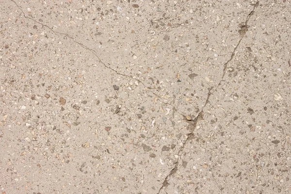 コンクリートスラブに亀裂 石のパン粉を使ったコンクリートのスラブ — ストック写真