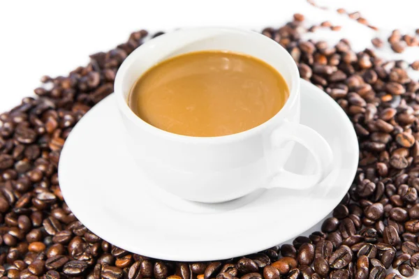 Cup of coffee with beans — Stock Photo, Image