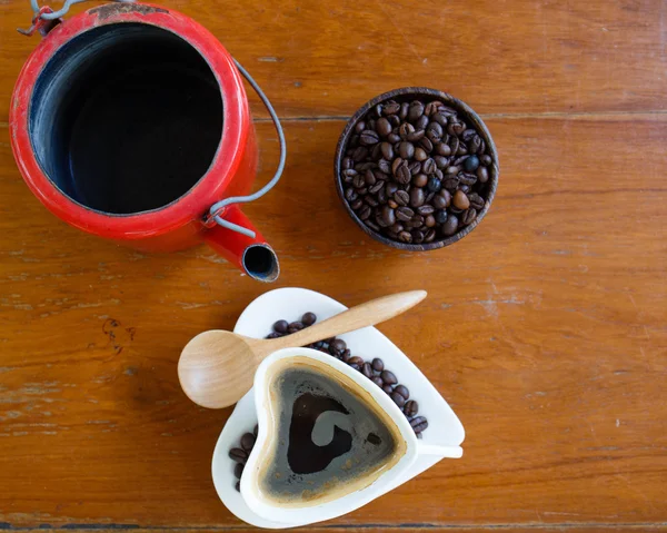 Coffee cup and coffee beans — Stock Photo, Image