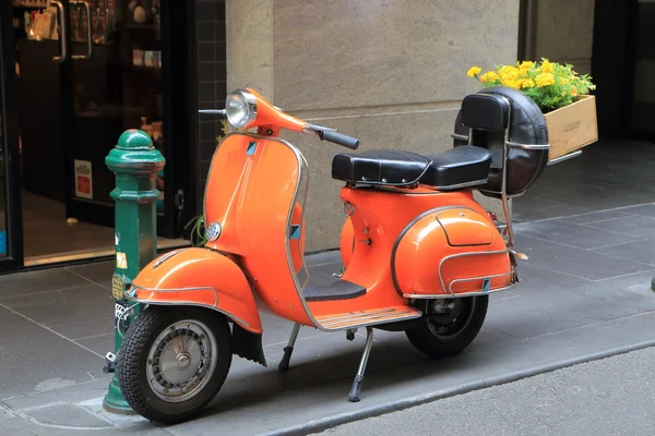 Orange scooter motorbike — Stock Photo, Image