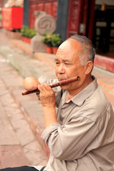 Pouliční muzikant v Luodai Chengdu, Čína — Stock fotografie