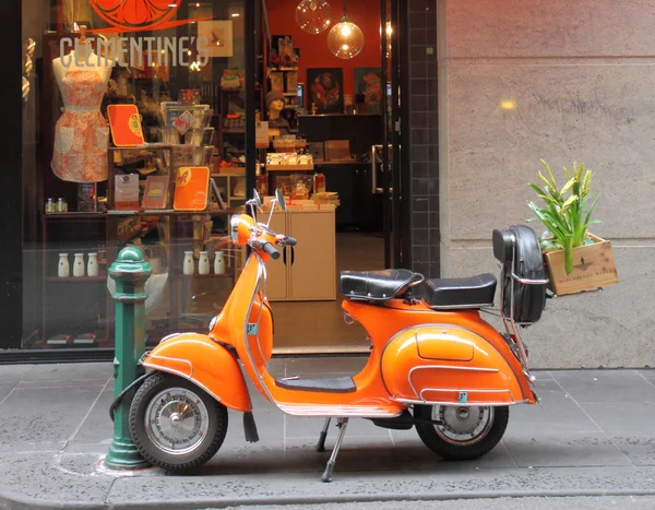 Orange Vespa motorbike — Stock Photo, Image