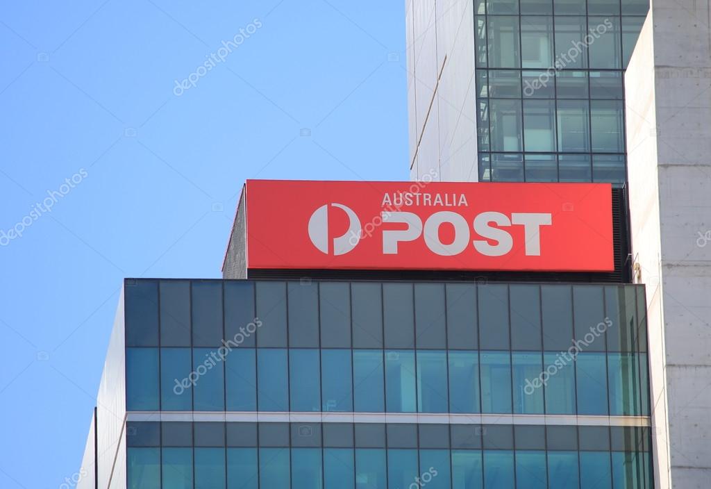 MELBOURNE AUSTRALIA - March 8,2014: Australia Post logo in Melbourne - Australia Post provides postal services in Australia and its overseas territories and owned by Australian Government