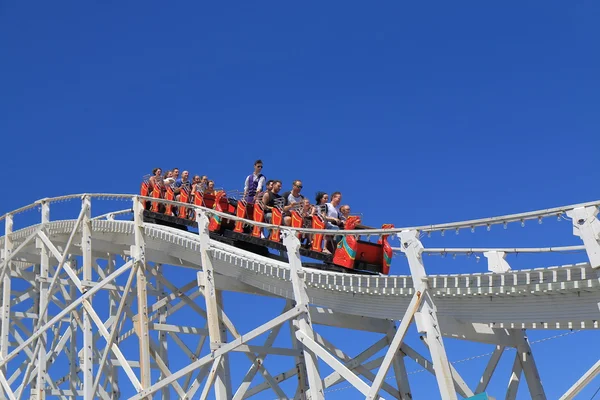 Amusement park roller coaster ride — Stok fotoğraf