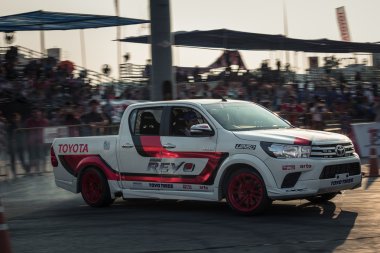 Pick-up car perform drifting on the track with motion blur