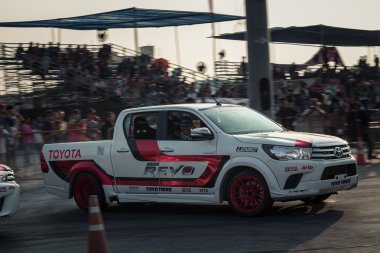 Pick-up car perform drifting on the track with motion blur