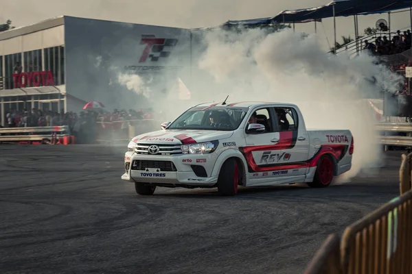 Pick-up car perform drifting with smoke