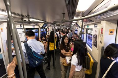 crowd of the passengers inside BTS public train