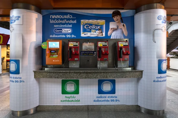 public payphone and top up machine at BTS public train station