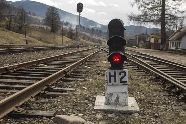 Traffic light with red signal on the railroad — Stock Photo, Image